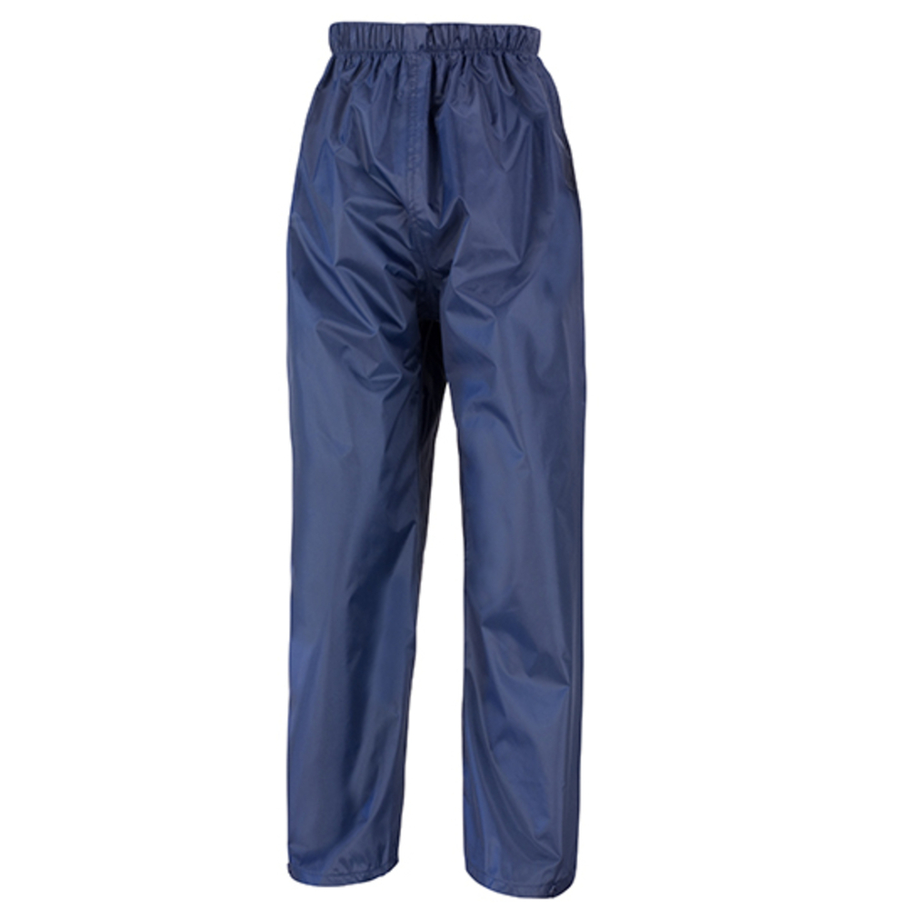 Junior impermeable sobre pantalones